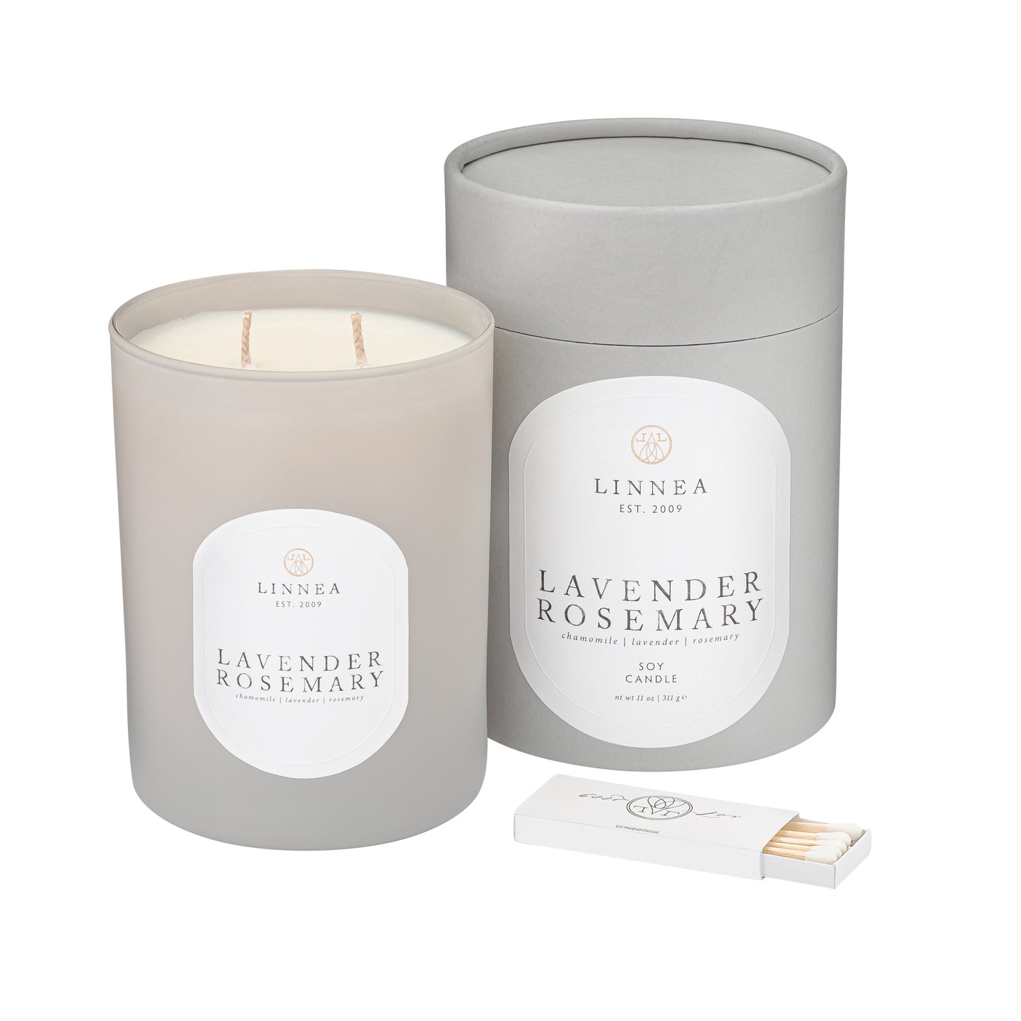 Lavender Rosemary candle with packaging and matches on a white background