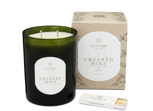 Linnea 'Crushed Mint' candle with packaging on a white background